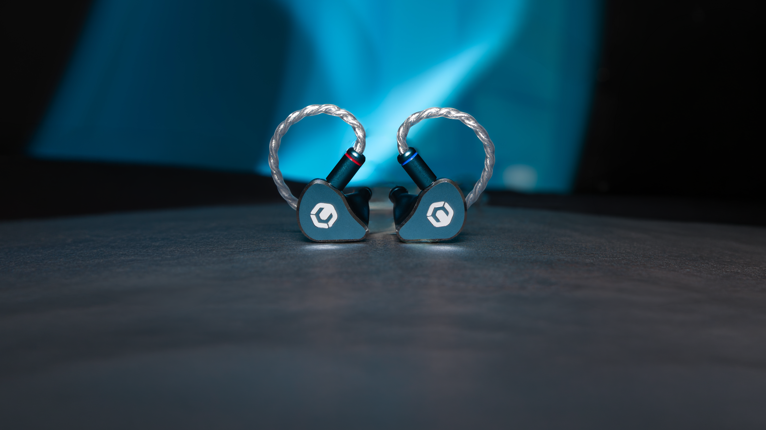 CrinEar Nightfall blue aluminium in-ear monitors in the manufacturer product photograph
